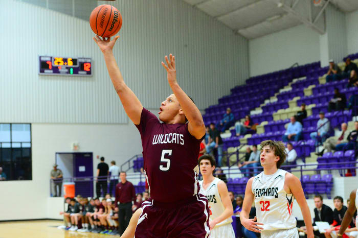 Patrick Mahomes drives to the basket in a high school game while playing for Whitehouse High School outside of Dallas. Mahomes's has revolutionized the quarterback position in the NFL with a few basketball twists.
